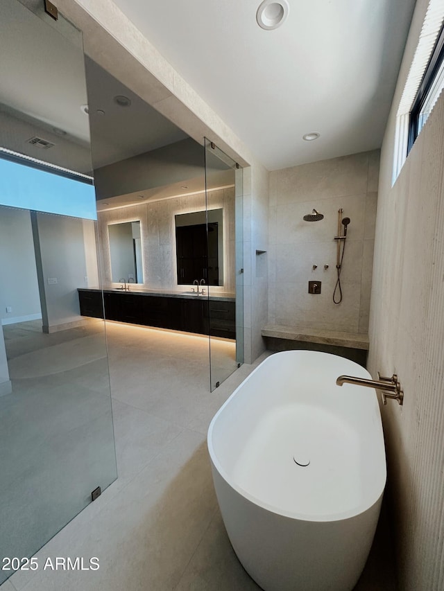 12863 E Cochise Rd, Scottsdale, AZ 85259 - bathroom featuring double vanity, a freestanding bath, healthy amount of natural light, and a shower