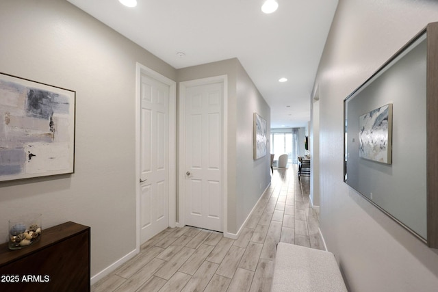738 W Kingman Dr, Casa Grande, AZ 85122 - hall with wood tiled floor, baseboards, and recessed lighting
