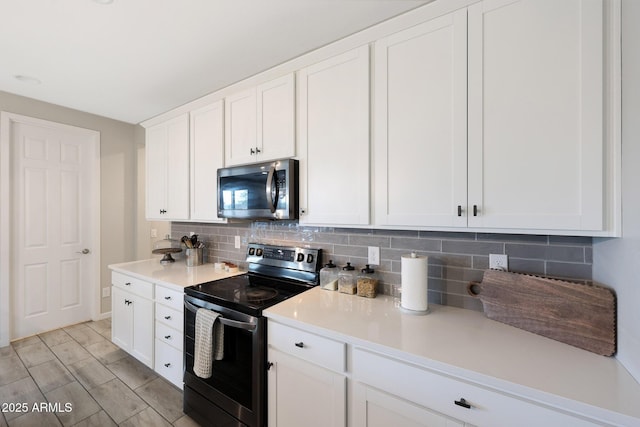 738 W Kingman Dr, Casa Grande, AZ 85122 - kitchen featuring white cabinets, stainless steel appliances, backsplash, and light countertops
