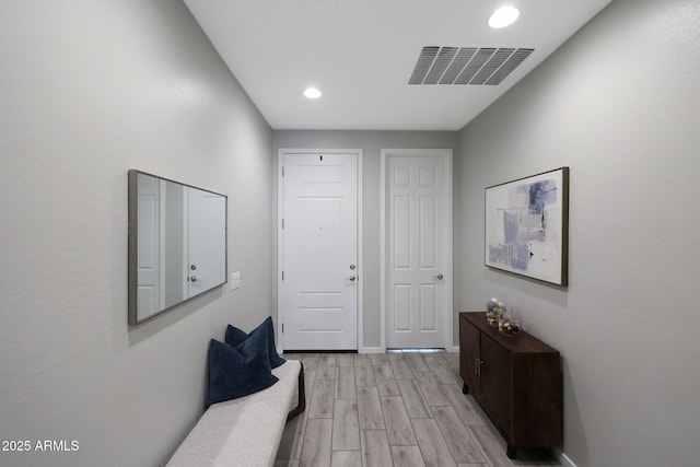 738 W Kingman Dr, Casa Grande, AZ 85122 - hall with baseboards, light wood-style flooring, visible vents, and recessed lighting