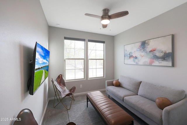 738 W Kingman Dr, Casa Grande, AZ 85122 - living room featuring carpet floors, a ceiling fan, and baseboards
