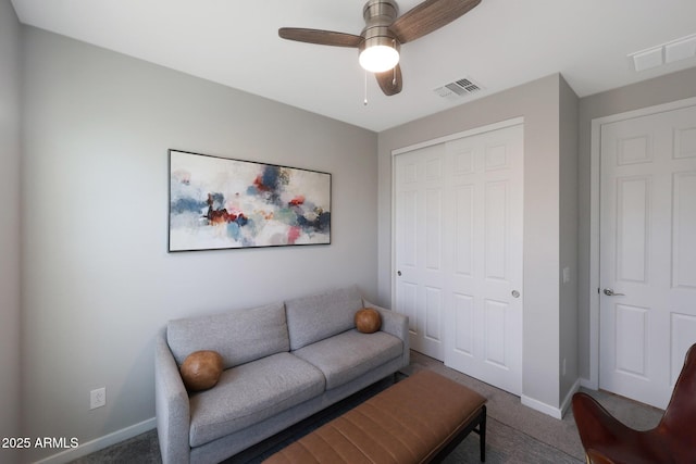 738 W Kingman Dr, Casa Grande, AZ 85122 - carpeted living room with baseboards, visible vents, and ceiling fan