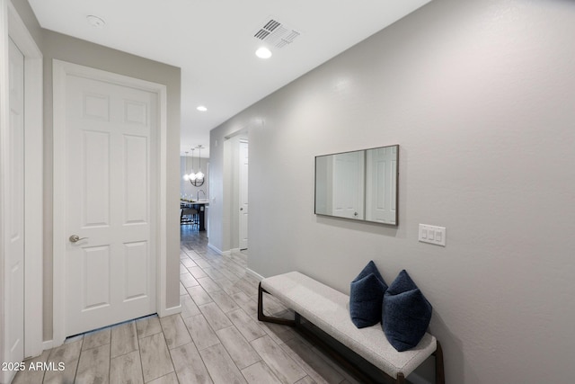 738 W Kingman Dr, Casa Grande, AZ 85122 - hallway featuring wood finish floors, visible vents, baseboards, and recessed lighting