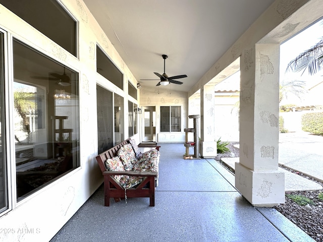 view of patio featuring ceiling fan