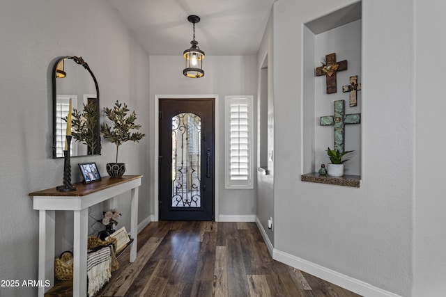 entryway featuring dark wood-type flooring