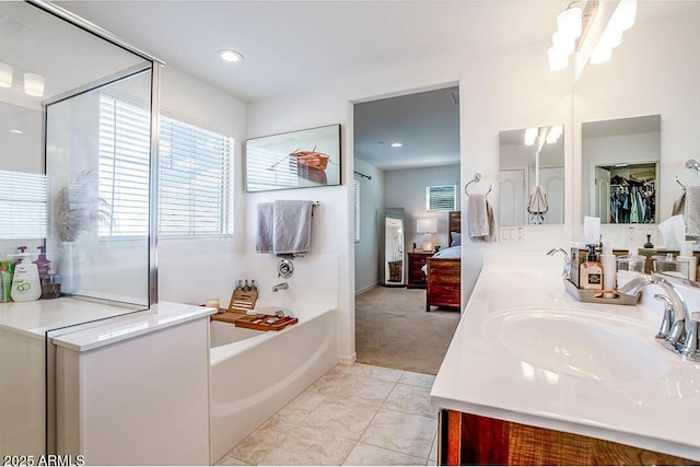 32047 N 125th Ave, Peoria, AZ 85383 - full bathroom featuring a bath, double vanity, ensuite bathroom, and recessed lighting