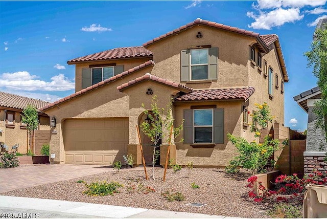 32047 N 125th Ave, Peoria, AZ 85383 - mediterranean / spanish-style home with a tile roof, stucco siding, driveway, and an attached garage