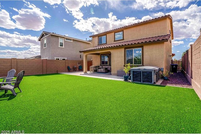 32047 N 125th Ave, Peoria, AZ 85383 - back of property featuring stucco siding, central AC unit, a patio area, outdoor lounge area, and a tiled roof