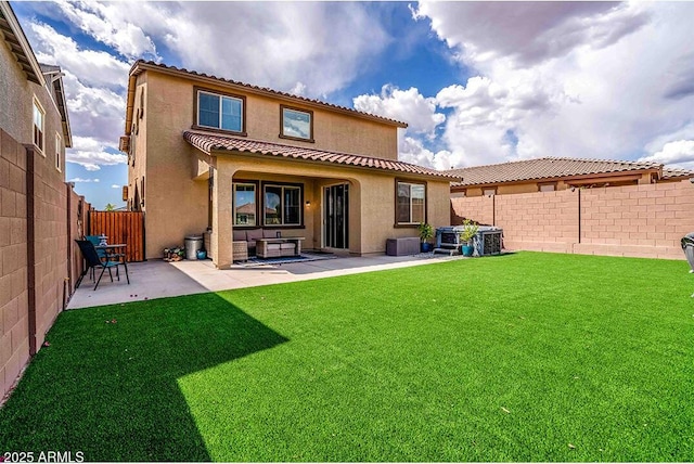 32047 N 125th Ave, Peoria, AZ 85383 - back of house featuring stucco siding, a patio area, and a tiled roof