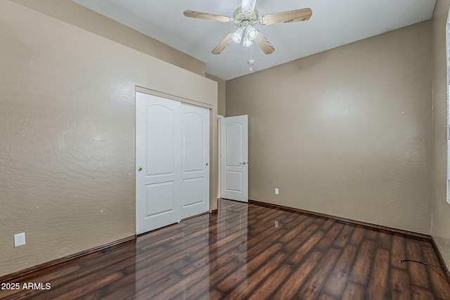 1391 W Windhaven Ave, Gilbert, AZ 85233 - unfurnished bedroom with wood finished floors, a closet, baseboards, and a ceiling fan