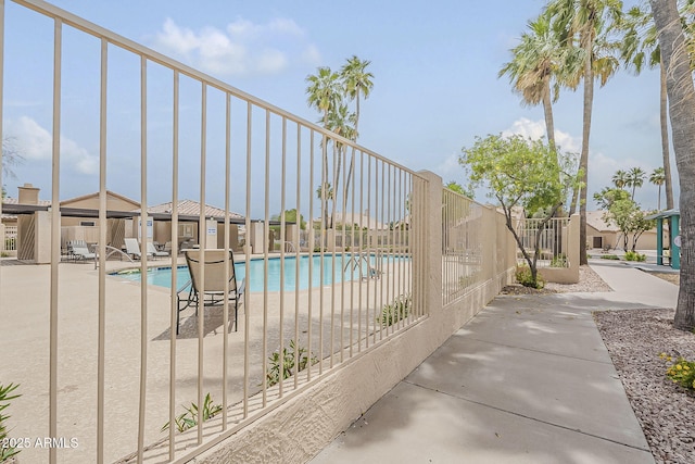 1391 W Windhaven Ave, Gilbert, AZ 85233 - community pool with fence and a patio area
