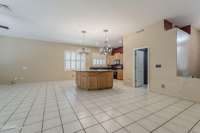 1391 W Windhaven Ave, Gilbert, AZ 85233 - kitchen featuring black appliances, a chandelier, dark countertops, a kitchen island, and open floor plan