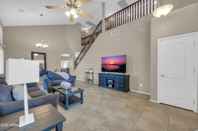2016 S 102nd Ln, Tolleson, AZ 85353 - living area featuring a ceiling fan, arched walkways, high vaulted ceiling, baseboards, and a chandelier