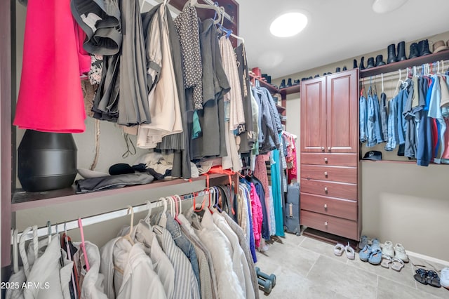 2016 S 102nd Ln, Tolleson, AZ 85353 - spacious closet with tile patterned floors