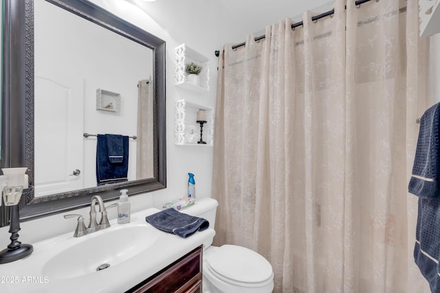 2016 S 102nd Ln, Tolleson, AZ 85353 - bathroom featuring vanity, toilet, and curtained shower