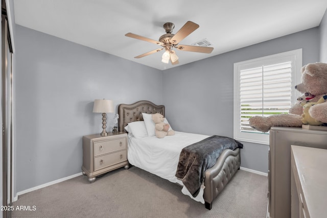 2016 S 102nd Ln, Tolleson, AZ 85353 - bedroom featuring light carpet, baseboards, and a ceiling fan