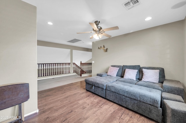 2016 S 102nd Ln, Tolleson, AZ 85353 - living room with ceiling fan, wood finished floors, recessed lighting, and baseboards