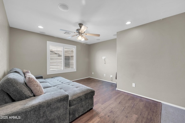 2016 S 102nd Ln, Tolleson, AZ 85353 - living area featuring ceiling fan, dark wood-style floors, baseboards, and recessed lighting