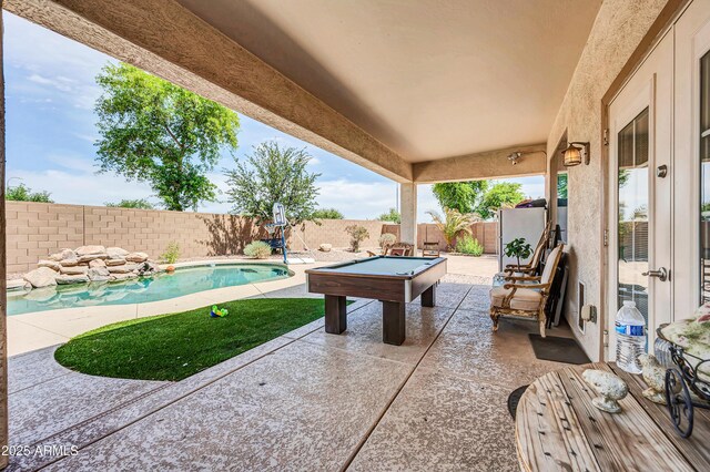 2016 S 102nd Ln, Tolleson, AZ 85353 - fenced backyard with a patio