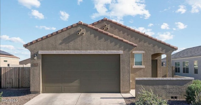 view of front of home with a garage