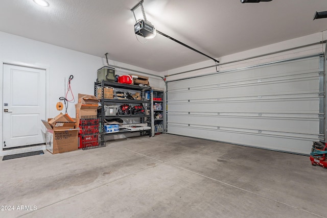 garage featuring a garage door opener