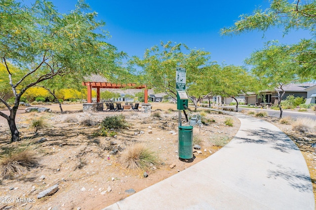 view of property's community featuring a pergola