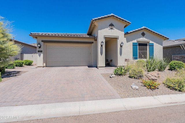 view of front of property featuring a garage