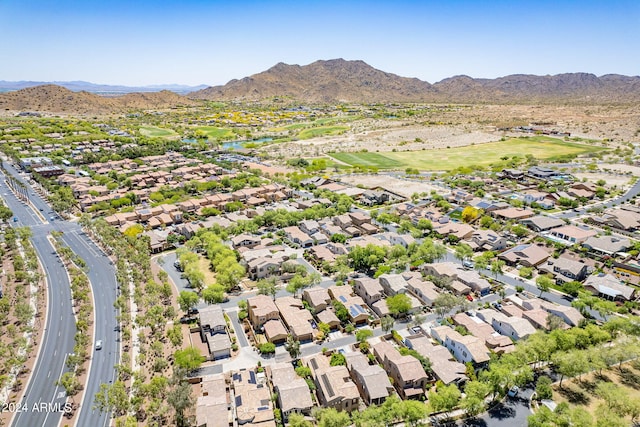 drone / aerial view featuring a mountain view