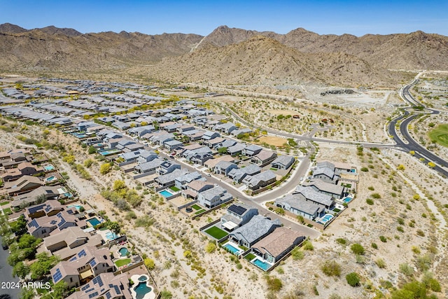 drone / aerial view featuring a mountain view