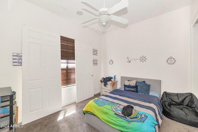 bedroom with ceiling fan and carpet