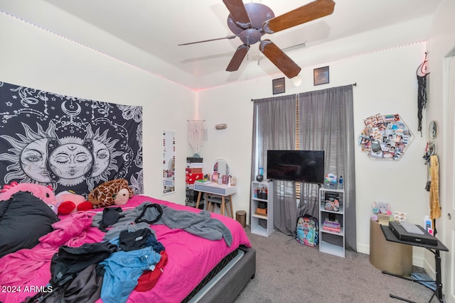 bedroom with ceiling fan and carpet