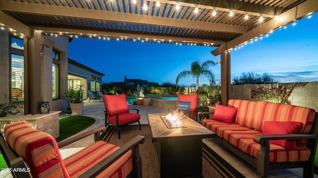 view of patio / terrace with a fenced backyard, an outdoor living space with a fire pit, and a pergola