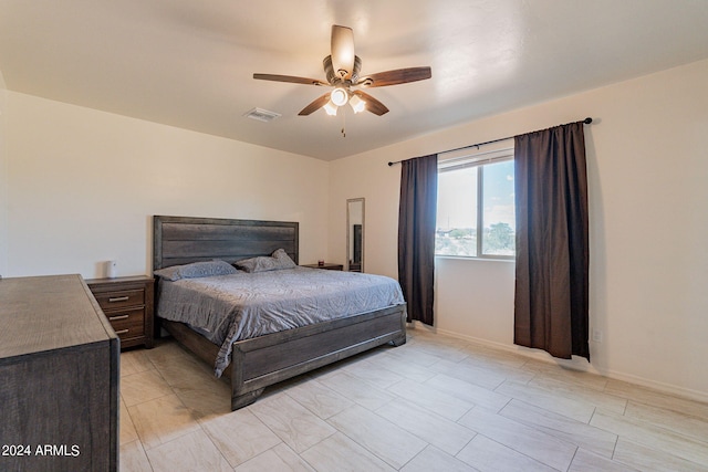 bedroom featuring ceiling fan