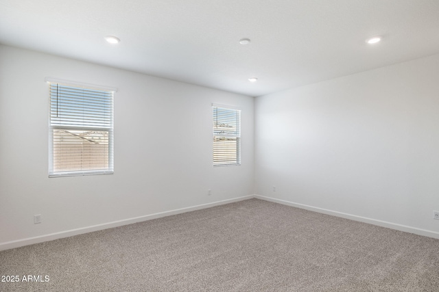 17848 W Mission Ln, Waddell, AZ 85355 - carpeted empty room with baseboards and recessed lighting