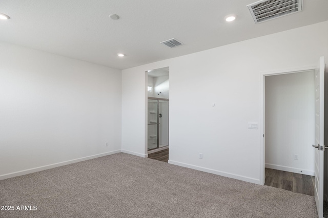 17848 W Mission Ln, Waddell, AZ 85355 - unfurnished bedroom featuring carpet, recessed lighting, baseboards, and connected bathroom