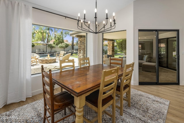 dining area with wood finished floors