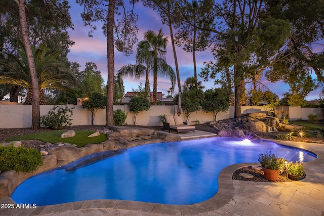 view of pool featuring a fenced backyard