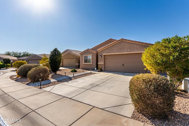 ranch-style house featuring a garage