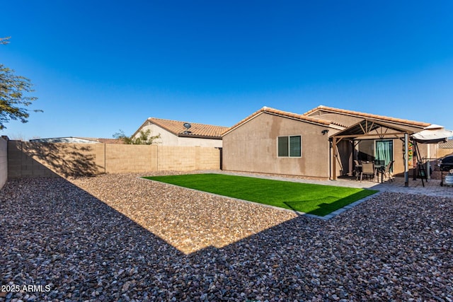 rear view of property with a patio