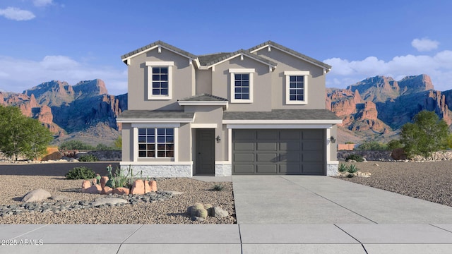 24205 W Southgate Ave, Buckeye, AZ 85326 - traditional-style home featuring concrete driveway, a mountain view, stone siding, an attached garage, and stucco siding