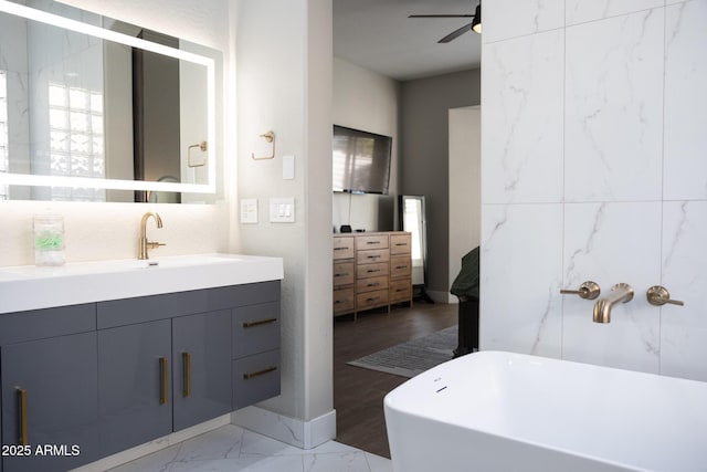 25454 N 73rd Ave, Peoria, AZ 85383 - bathroom with marble finish floor, ceiling fan, a freestanding tub, and vanity