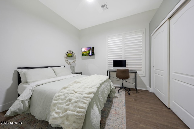 25454 N 73rd Ave, Peoria, AZ 85383 - bedroom with vaulted ceiling, a closet, wood finished floors, baseboards, and visible vents