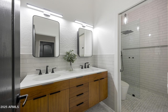 25454 N 73rd Ave, Peoria, AZ 85383 - full bathroom with tile walls, a sink, and a stall shower