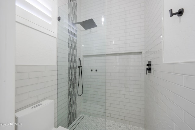 25454 N 73rd Ave, Peoria, AZ 85383 - bathroom featuring tile walls, toilet, and walk in shower