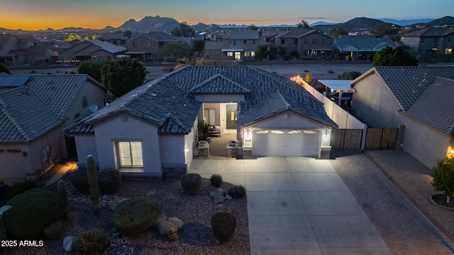 25454 N 73rd Ave, Peoria, AZ 85383 - view of front of home featuring a residential view, driveway, stucco siding, and fence