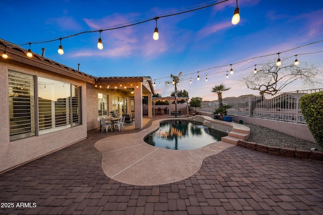 25454 N 73rd Ave, Peoria, AZ 85383 - pool at dusk featuring a fenced in pool, a fenced backyard, and a patio area