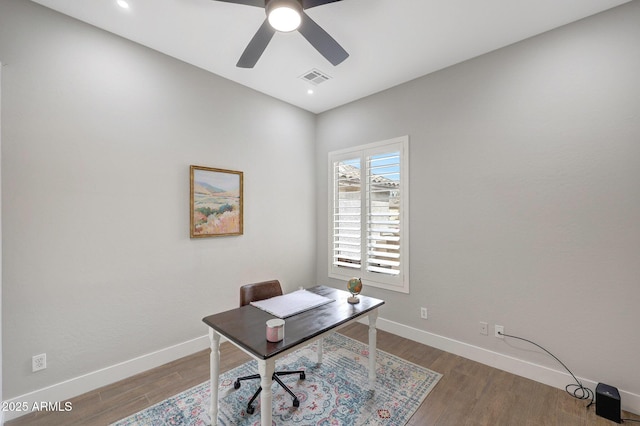 25454 N 73rd Ave, Peoria, AZ 85383 - home office with baseboards, visible vents, wood finished floors, and a ceiling fan