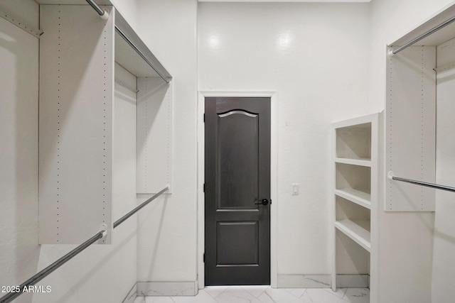 25454 N 73rd Ave, Peoria, AZ 85383 - walk in closet featuring marble finish floor