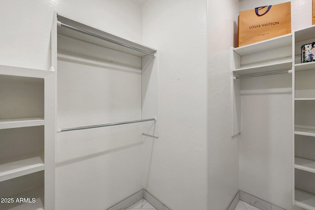 25454 N 73rd Ave, Peoria, AZ 85383 - walk in closet featuring marble finish floor