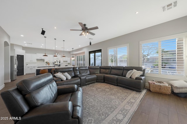 25454 N 73rd Ave, Peoria, AZ 85383 - living area with visible vents, baseboards, ceiling fan, wood finished floors, and recessed lighting